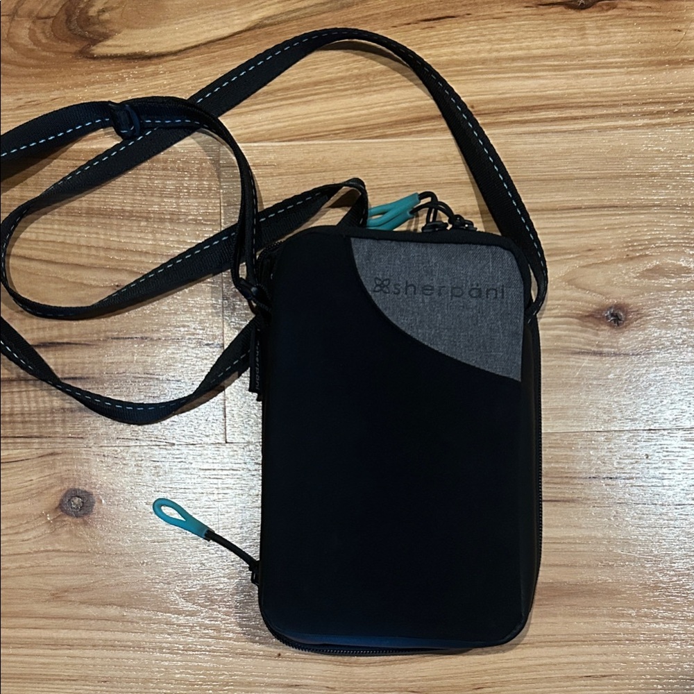 Sherpani Black and Gray phone cross body bag